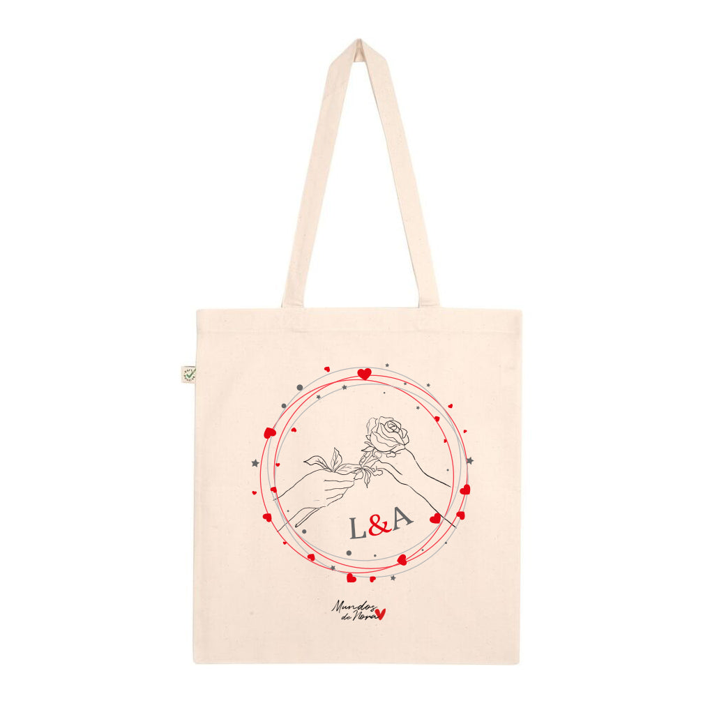 Tote bag personalizada con diseño de mano regalando una rosa: el regalo perfecto para tu pareja